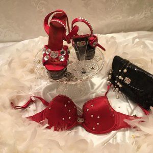 AMAZING vinatge cherry red glass platforms with hell kitty crystal details!